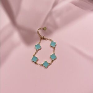 Elegant Gold and Blue Clover Bracelet